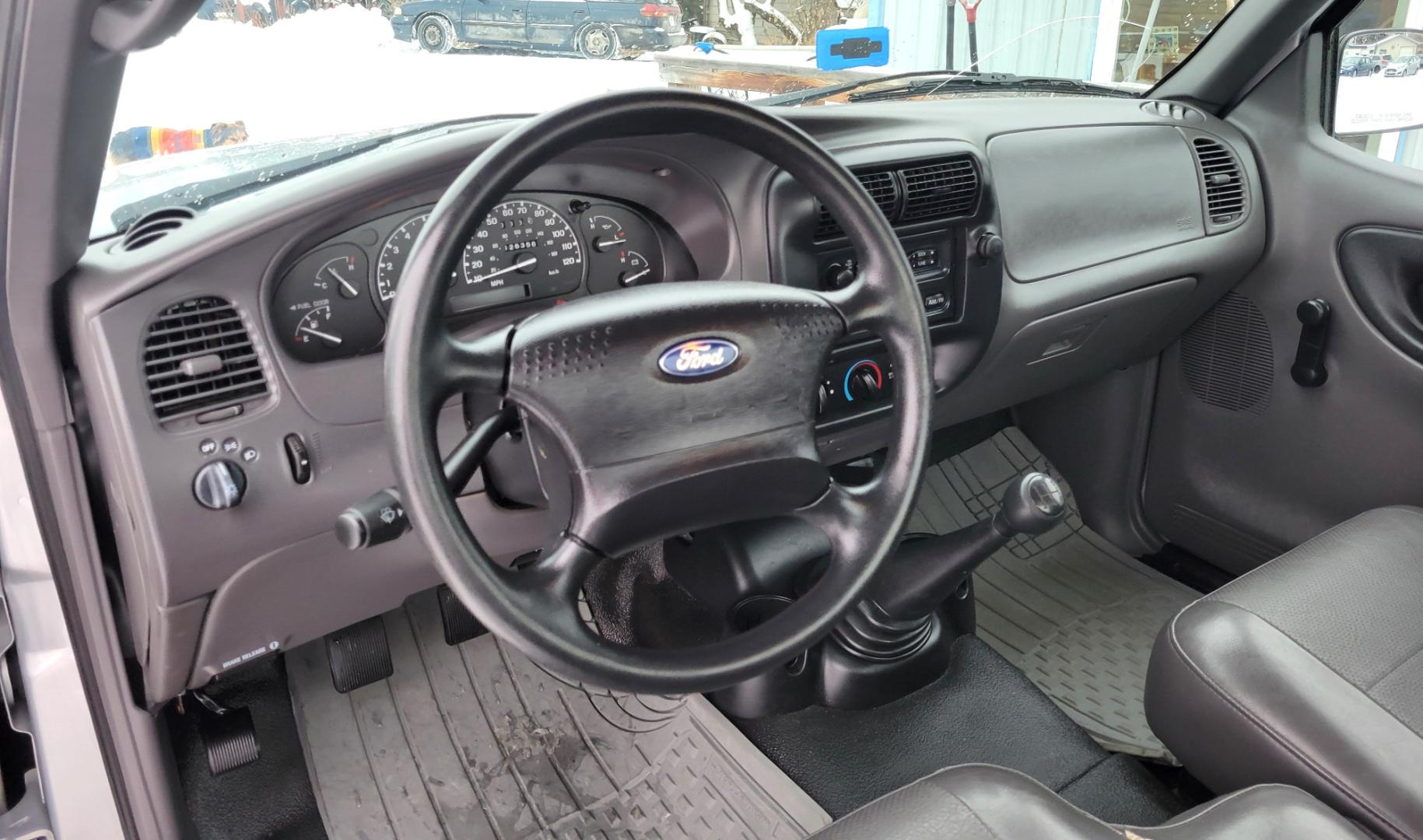 2003 Silver /Black Ford Ranger XL (1FTYR10D63P) with an 2.3L I4 engine, 5 Speed Manual transmission, located at 450 N Russell, Missoula, MT, 59801, (406) 543-6600, 46.874496, -114.017433 - One Owner. Great running 2WD Truck. 5 Speed manual Transmission. Air Conditioning. Bed Liner. This vehicle is 20 years old and is not eligible for lending through our finance companies. - Photo#8